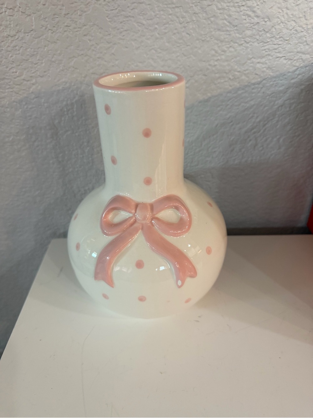 White Ceramic Vase with Pink Polka Dots and Raised Pink Bow